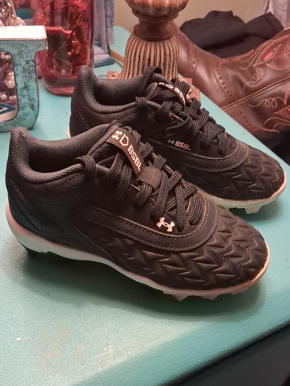 Under Armour Black Youth Athletic Cleats with White Labeling